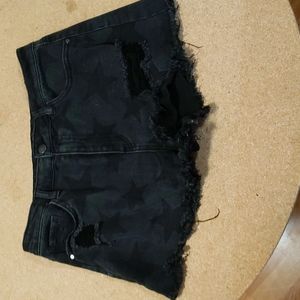 Black star jean shorts